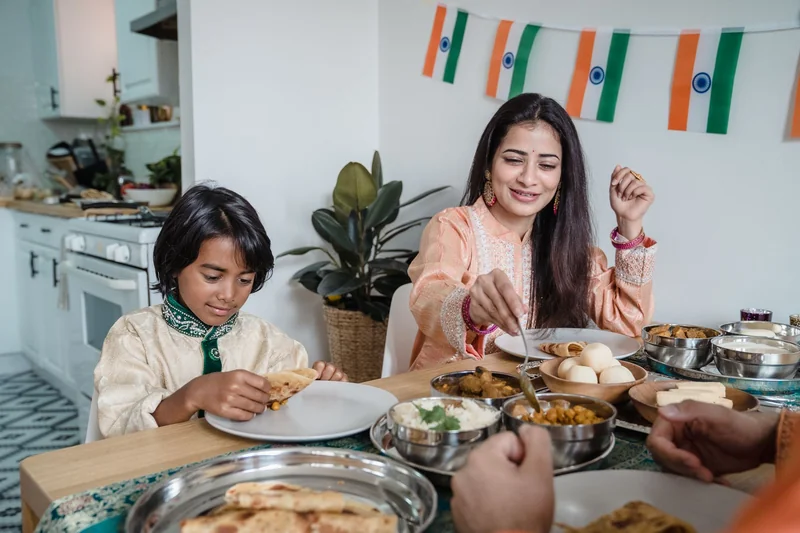 Mother eating a home-cooked meal with her children